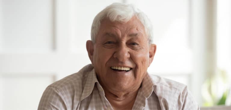 Older man smiling with dentures from Spring, TX dentures dentist