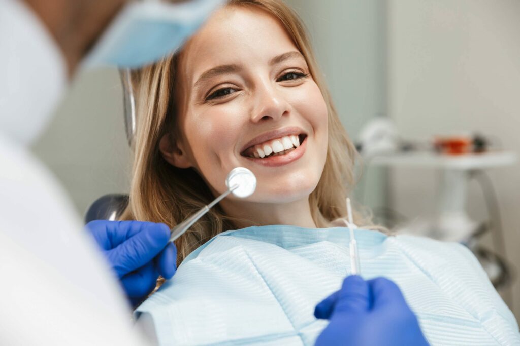 Tooth Extraction patient smiling at Oak Hills Dentistry in Spring, TX