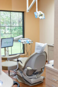 Dental chair with a Spring, TX view at Oak Hills Dentistry